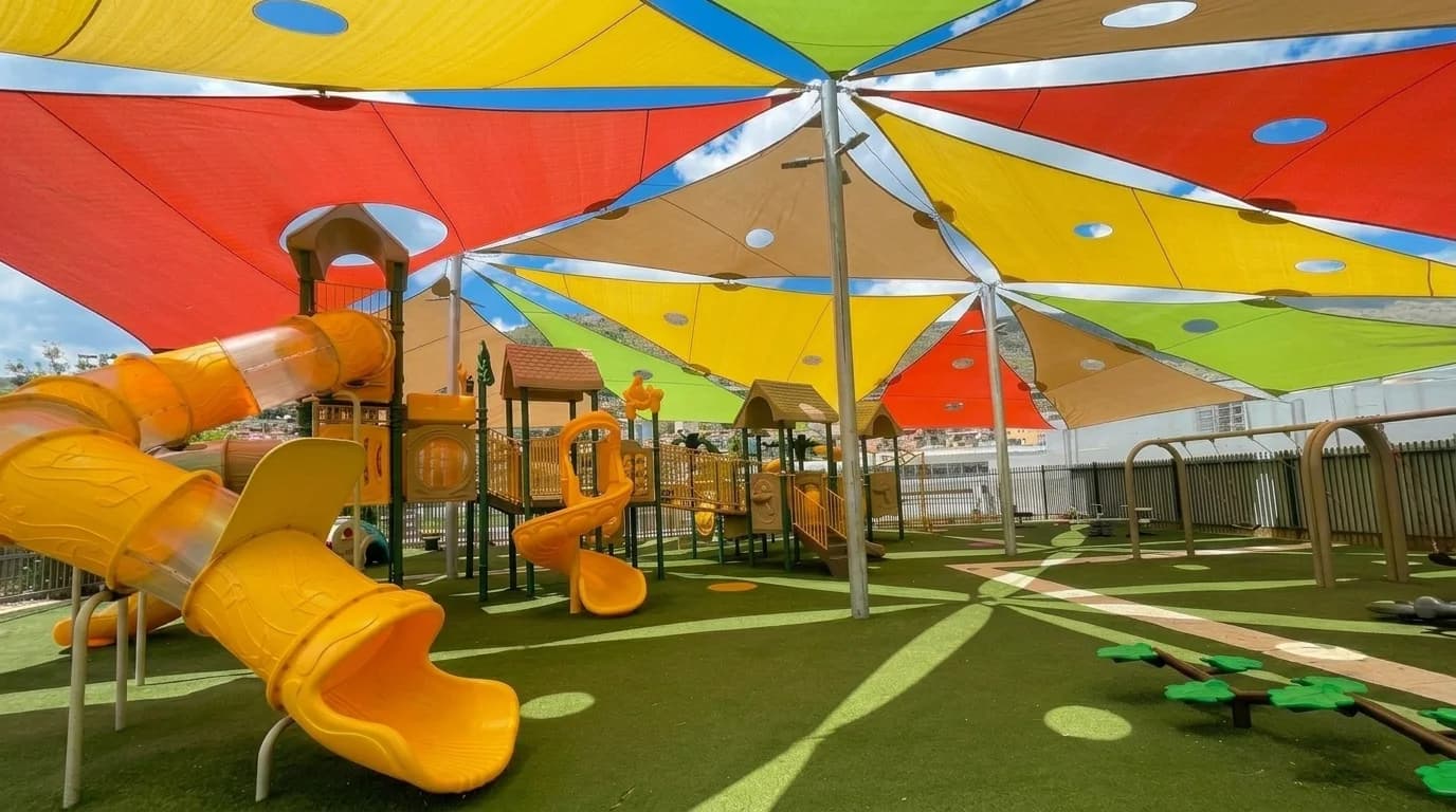 Children’s playground with colorful shade canopy at Majdal Shams Park